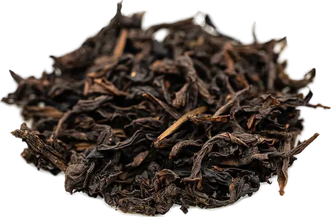 Loose, twisted dark leaves of Wild Qizhong oolong